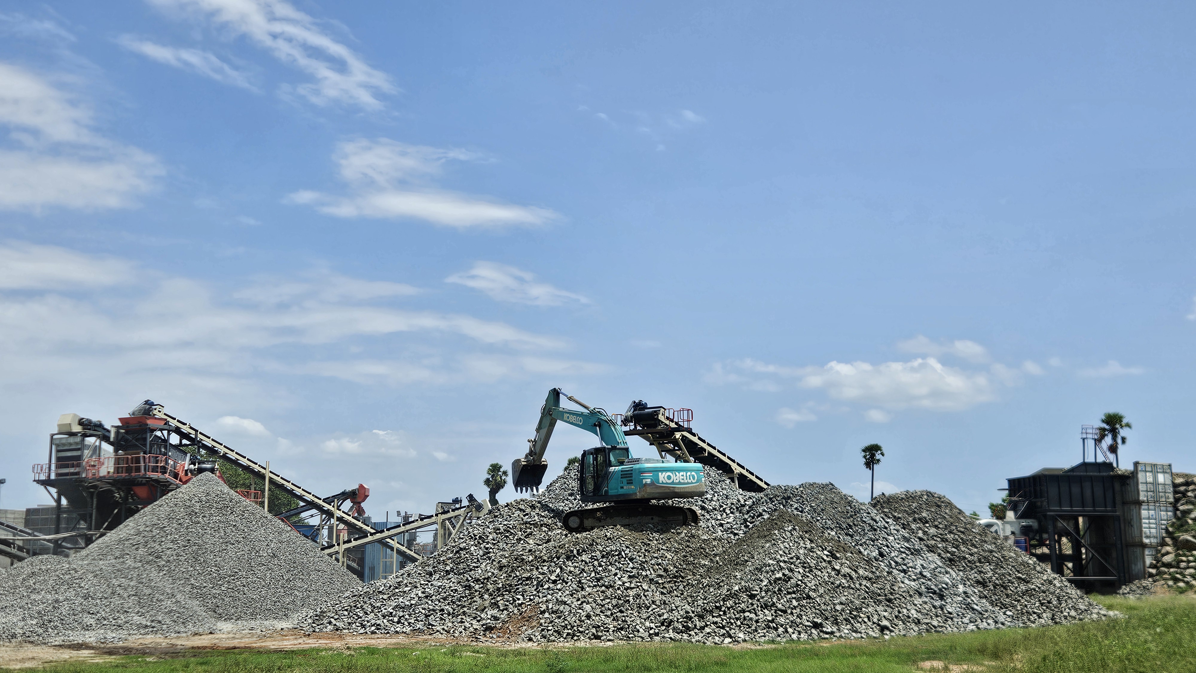 Kobelco excavator loading aggregate at SNP plant